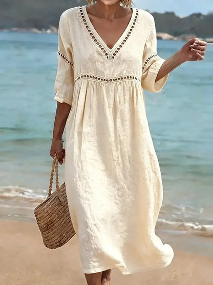 Vestido de mulher em algodão, liso, elegante e casual, para o verão, num estilo retro.