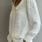 Camisola retro de gola redonda com bordado floral