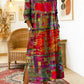 Vestido de mulher em algodão com estampado étnico e patchwork, com acabamento em renda.