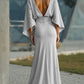 Vestido elegante com decote em V, costas nuas e mangas morcego