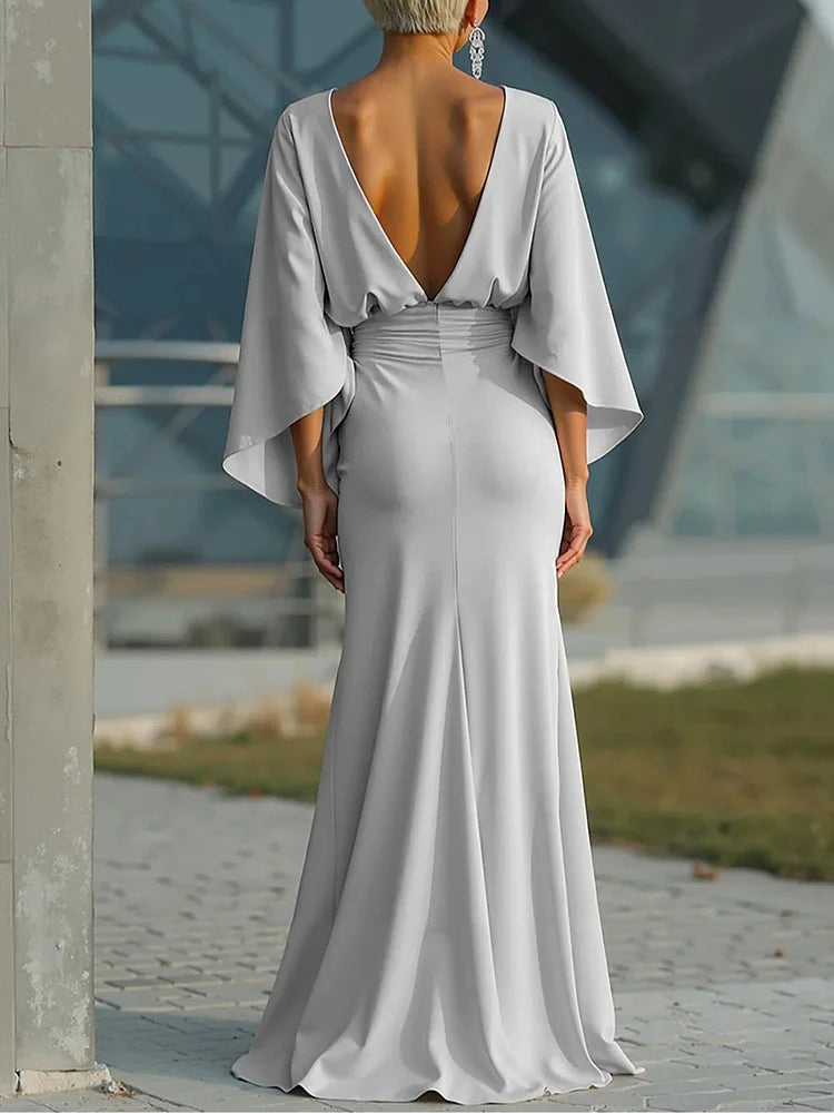 Vestido elegante com decote em V, costas nuas e mangas morcego