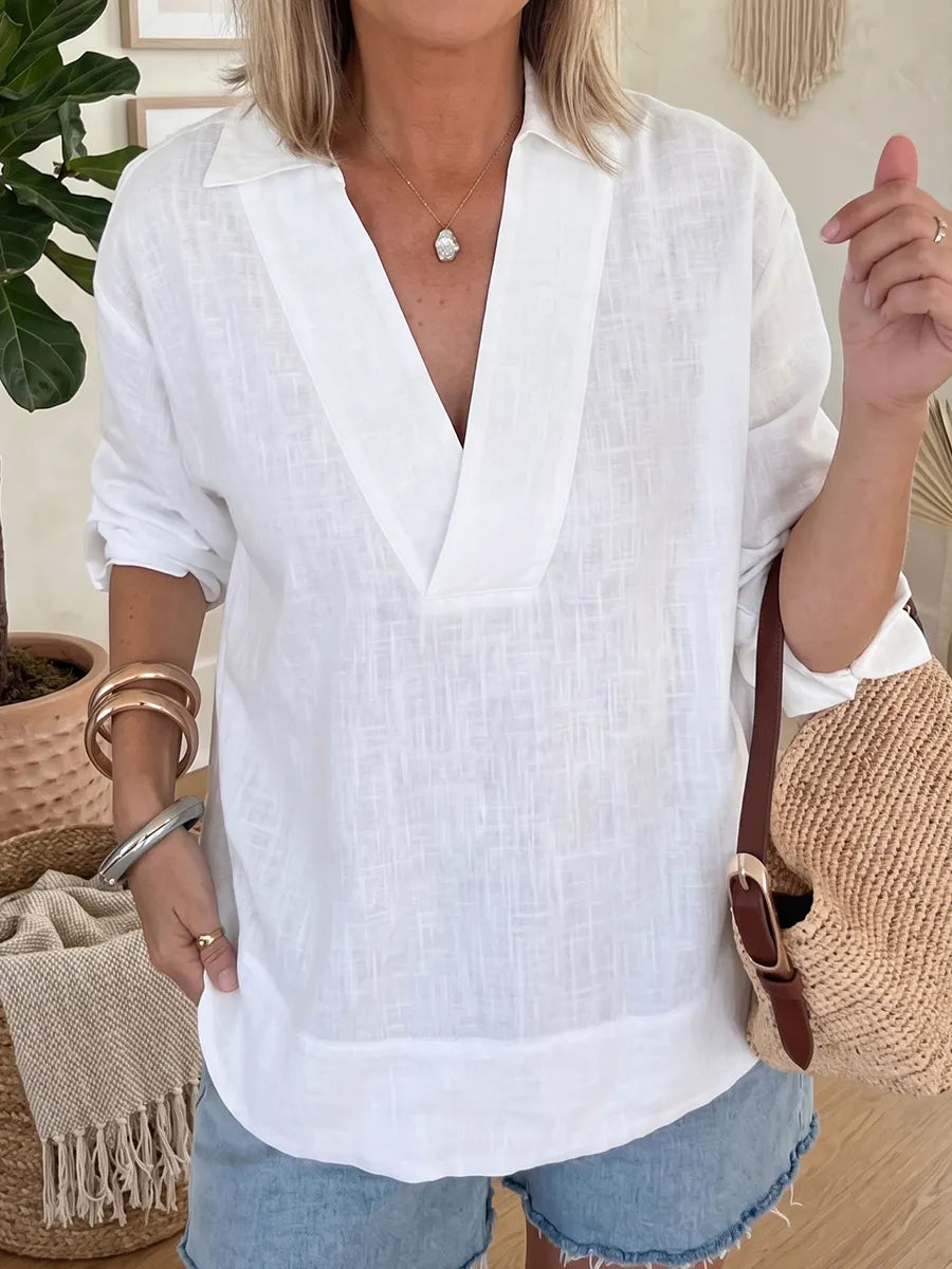 Blusa de algodão e linho com decote em V, minimalista e aconchegante