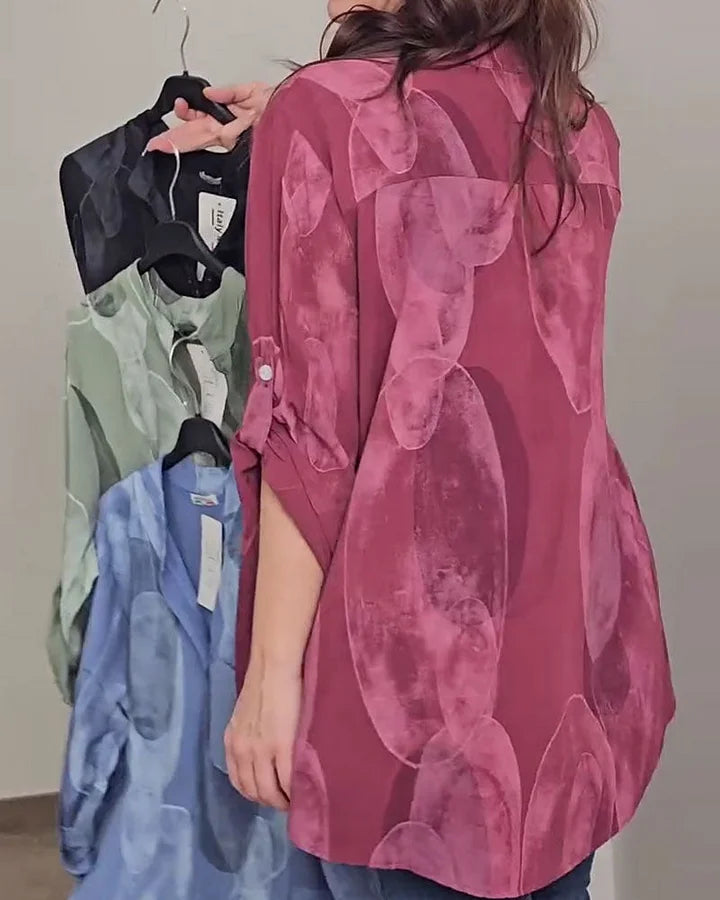 Camisa de senhora estampada com bolsos com botões