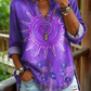 Camisa casual de mulher em algodão denim lavado com estampado floral de girassóis e decote em V.