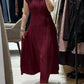 Vestido de senhora em algodão e linho, liso, sem mangas, com decote em V e corte largo.