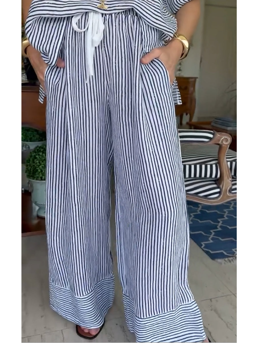 Conjunto de camisa de mulher às riscas de algodão e linho e bojo
