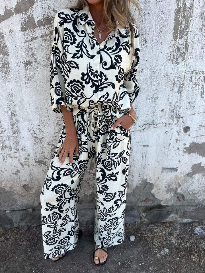 Camisa estampada para mulher com botões e calças largas (conjunto de 2)