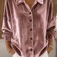 Blusa elegante em veludo com abotoamento simples