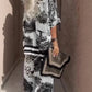 Fato de mulher casual e largo com decote em V e blusa e calças estampadas
