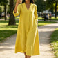 Vestido casual de mulher em algodão e linho com decote em V
