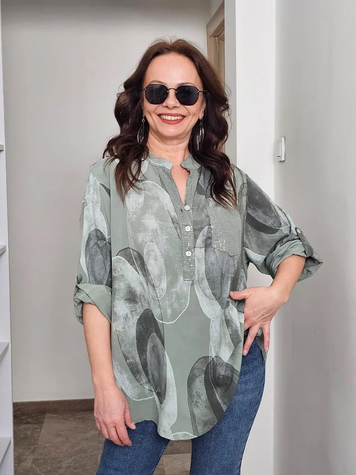 Camisa de senhora estampada com bolsos com botões