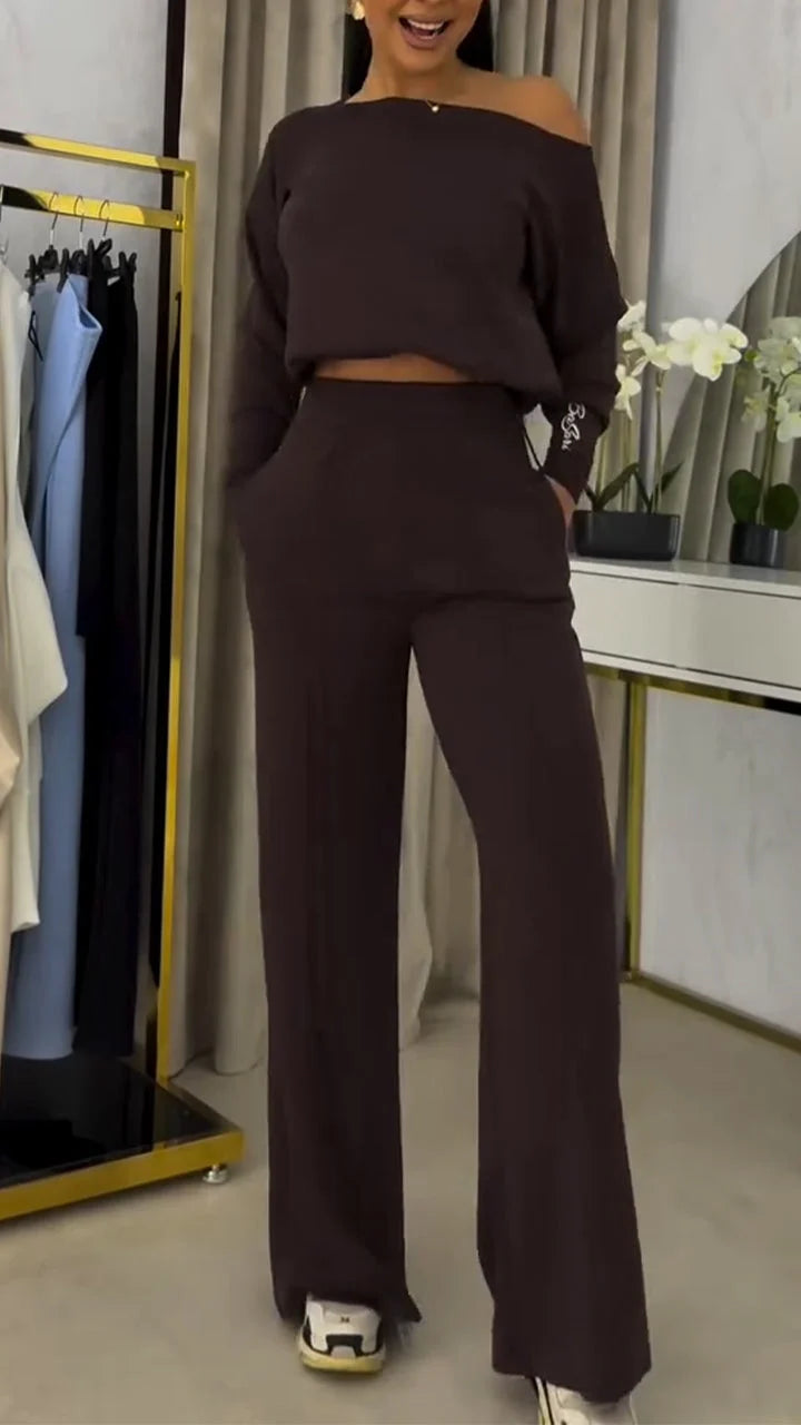 Conjunto de blusa ombro a ombro larga e calças casuais para menina