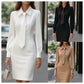 Vestido elegante e justo com mangas compridas e atilhos na altura da cintura