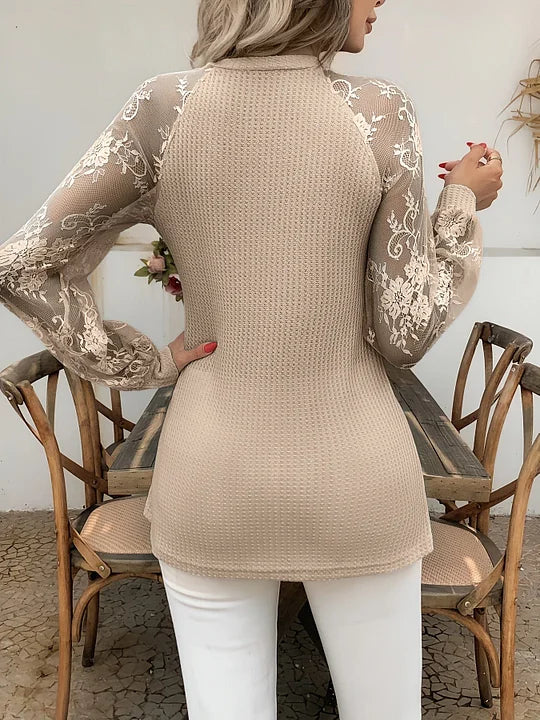 Elegante blusa comprida com decote em V e renda semitransparente