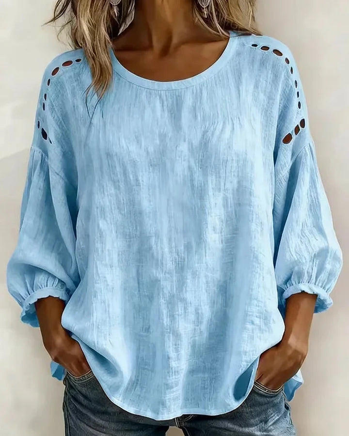Blusa de menina vazada em linho e algodão