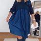 Vestido solto com estampado floral tridimensional e gola redonda
