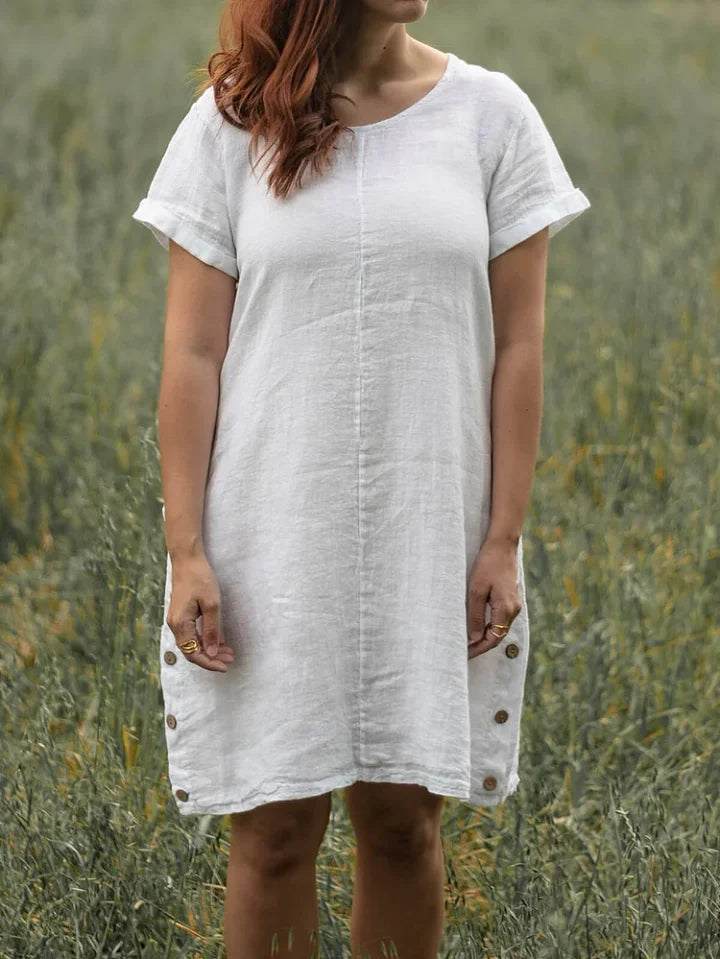 Vestido de linho de manga curta e gola redonda, modelo 2026