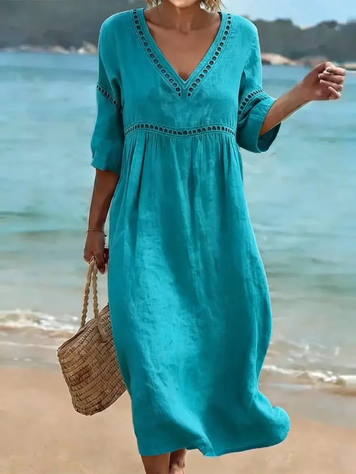Vestido de mulher em algodão, liso, elegante e casual, para o verão, num estilo retro.