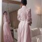 Vestido feminino elegante e moderno com mangas compridas vazadas