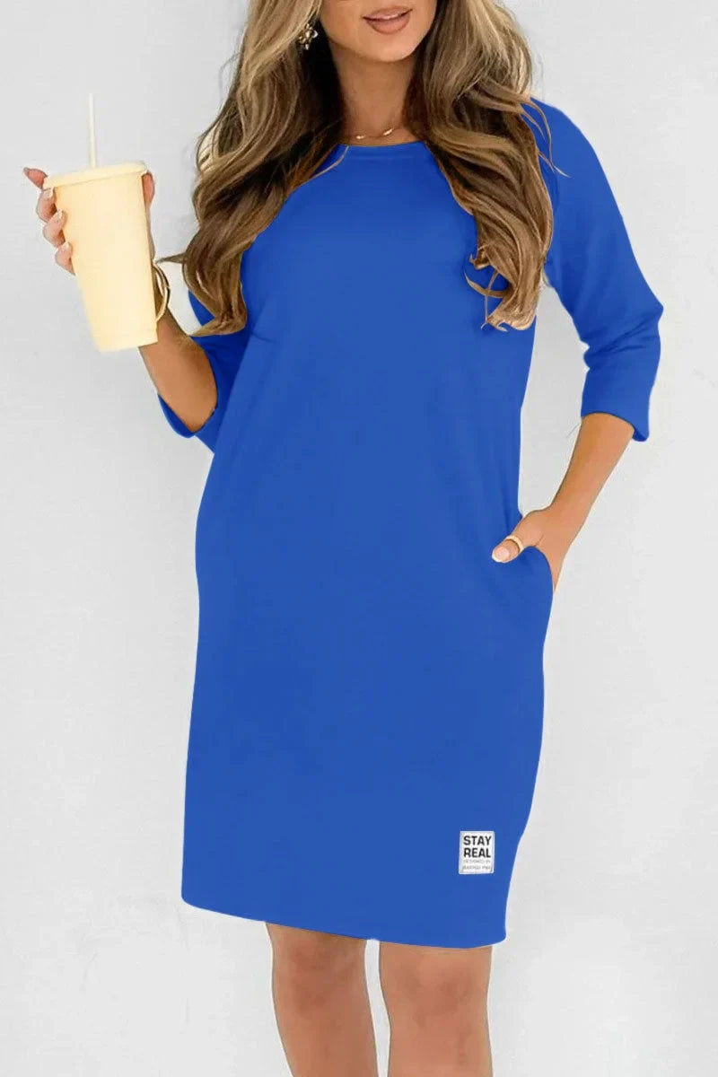 Vestido de mulher em algodão com decote redondo