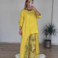 Fato casual de algodão e linho com blusa irregular e calças largas