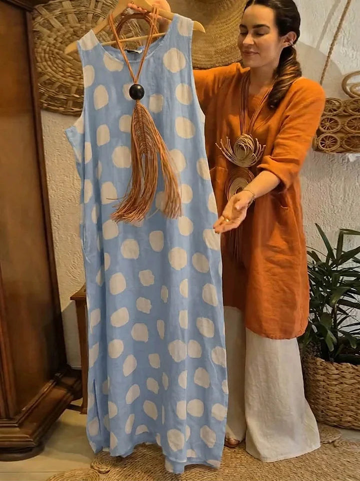 Vestido de senhora em algodão e linho, casual, largo, sem mangas, com estampado de bolinhas e gola redonda