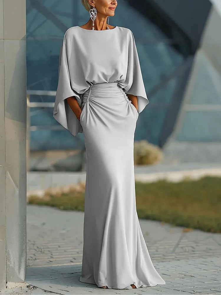 Vestido elegante com decote em V, costas nuas e mangas morcego