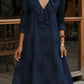 Vestido vintage com decote em V e folhos, bordado com flores