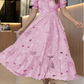 Vestido elegante com bordado floral vazado