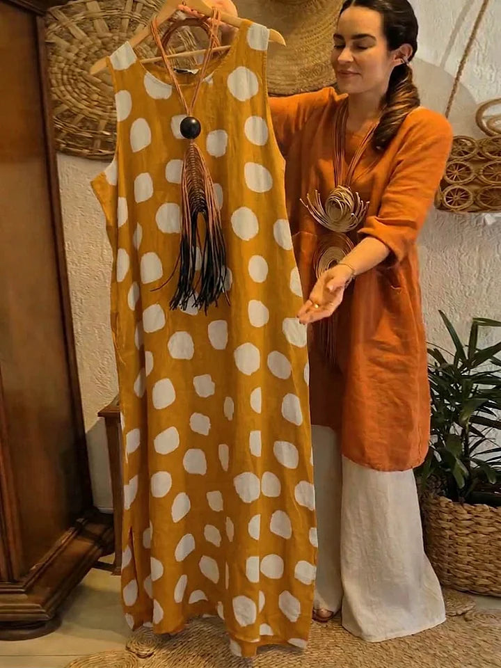 Vestido de senhora em algodão e linho, casual, largo, sem mangas, com estampado de bolinhas e gola redonda