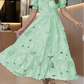 Vestido elegante com bordado floral vazado