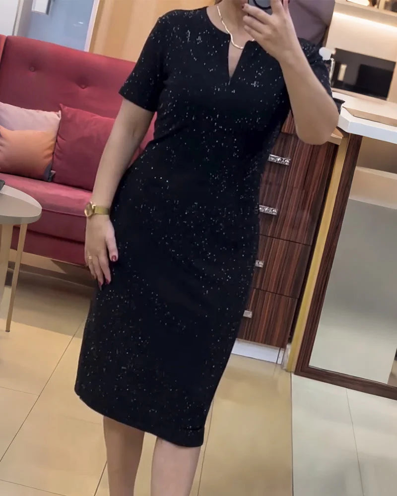 Vestido elegante e brilhante com decote em V