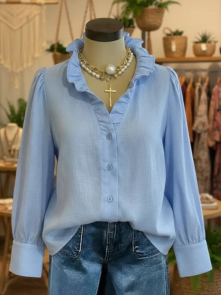 Camisa vintage romântica com decote em V franzido em mistura de linho e algodão.