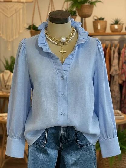 Camisa vintage romântica com decote em V franzido em mistura de linho e algodão.