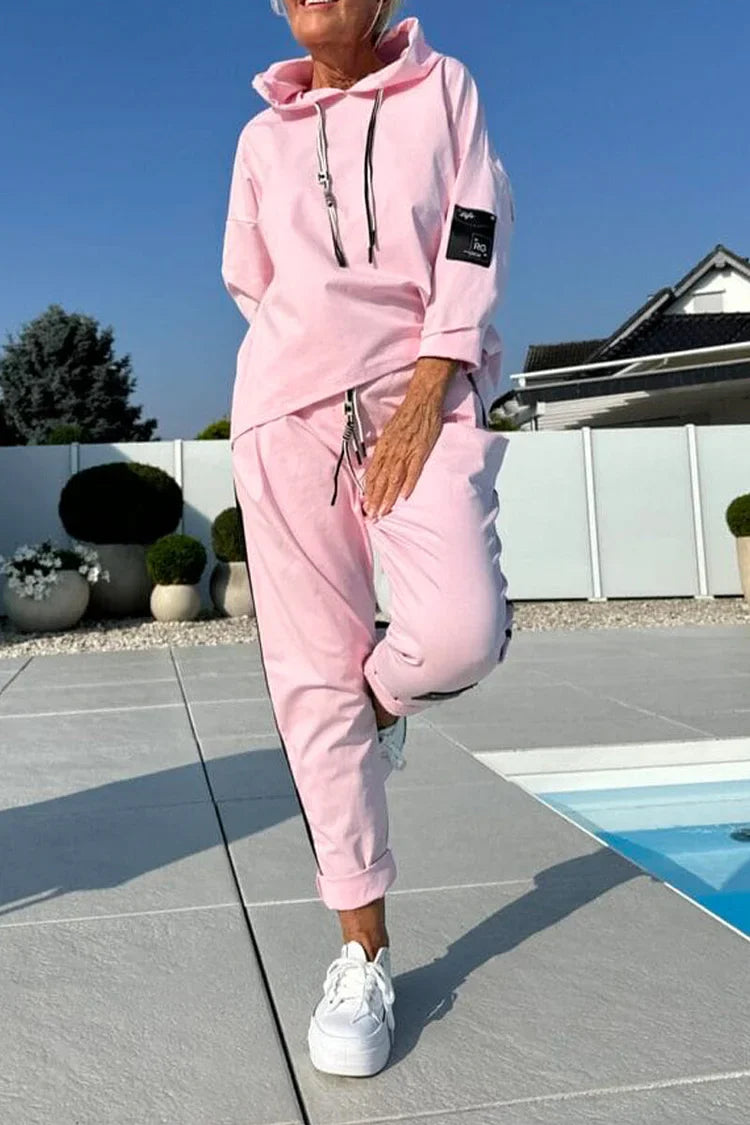 Blusa de mulher de gola redonda com cordão + calças listradas verticais e fato casual 2025