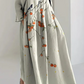 Elegante saia comprida feita de mistura de linho com renda floral bordada