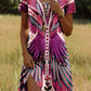 Vestido estampado com gola redonda e manga curta
