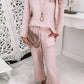 Conjunto de sweatshirt com decote em V e calças