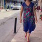 Vestido estampado com decote em V 2025