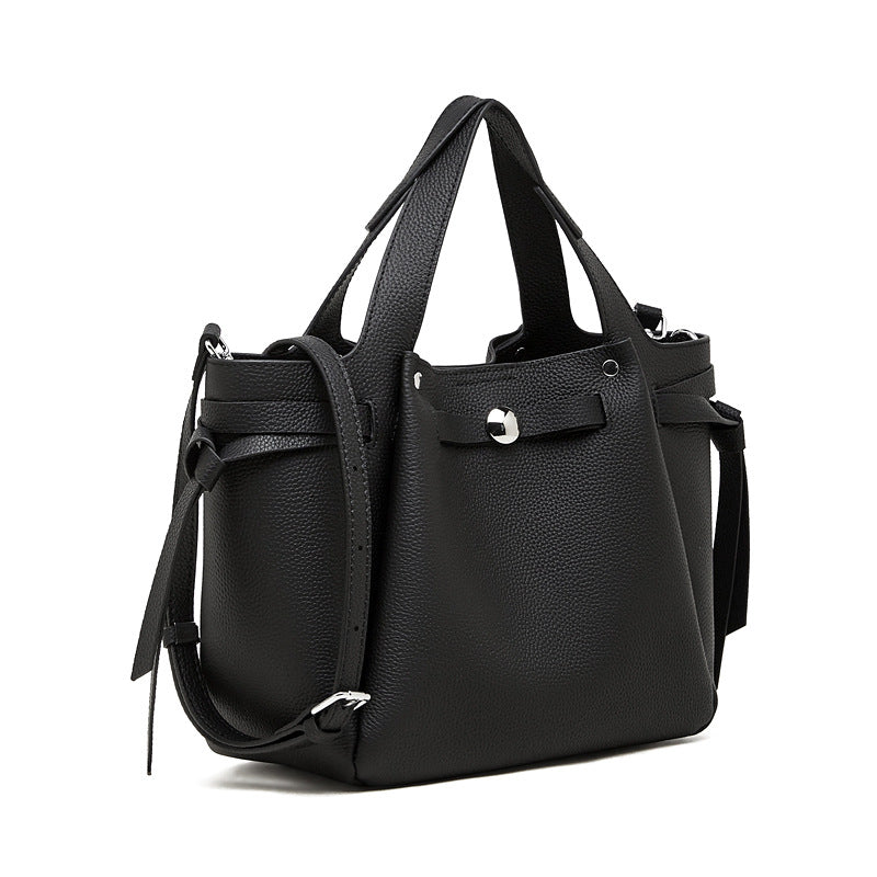 Bolsa em pele genuína com fecho de pressão