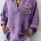 Camisa casual para mulher roxa com decote em V e motivo floral