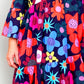 Vestido estampado floral com decote redondo, bolsos e calções
