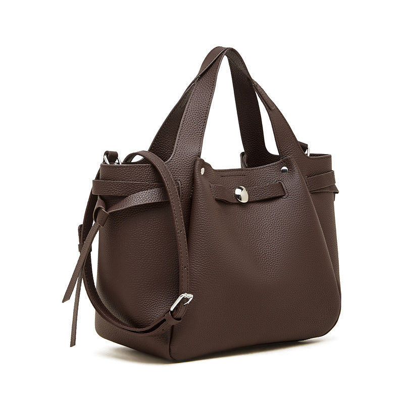 Bolsa em pele genuína com fecho de pressão