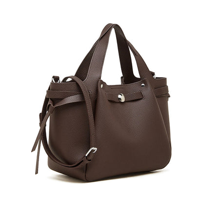 Bolsa em pele genuína com fecho de pressão