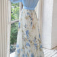 Elegante vestido comprido com estampado floral, decote em V e mangas compridas