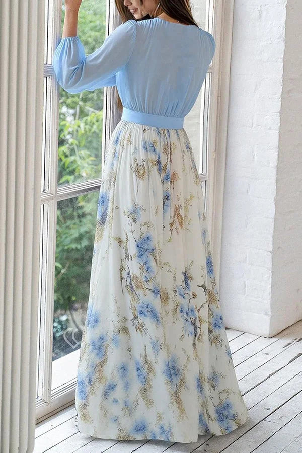 Elegante vestido comprido com estampado floral, decote em V e mangas compridas