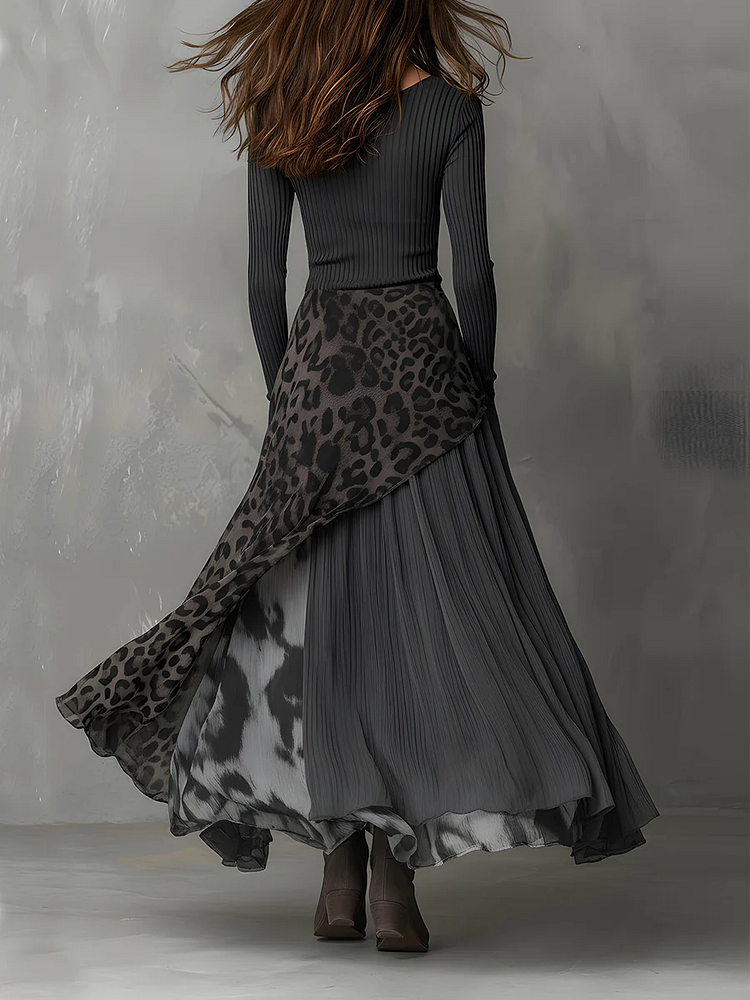 Vestido comprido com padrão leopardo e riscas cinzentas nas axilas, bainha irregular e detalhes em recortes