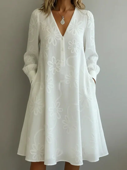 Vestido vintage elegante com decote em V e bordados florais