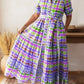 Vestido camiseiro com gola e estampado artístico de quadrados coloridos