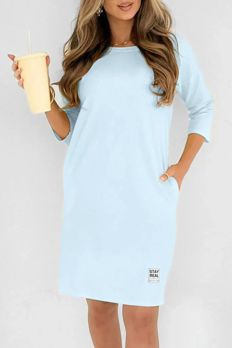 Vestido de mulher em algodão com decote redondo